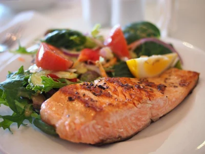 plate of food with salmon and salad